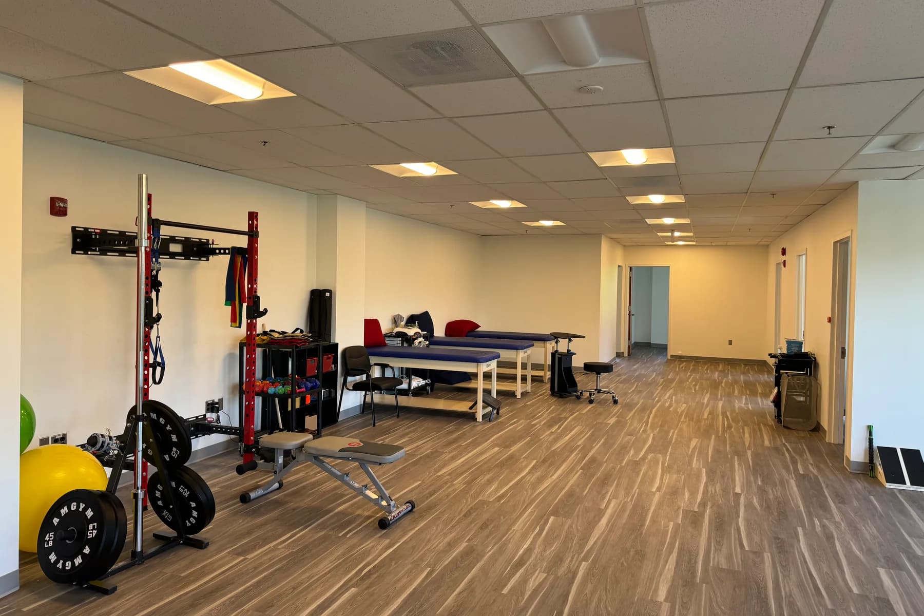 Exercise equipment and treatment tables in the Reston clinic.