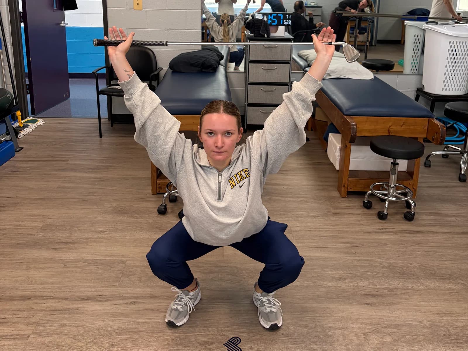 Overhead squat movement screening at the South Stafford clinic.